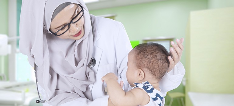 Doctor examining a patient