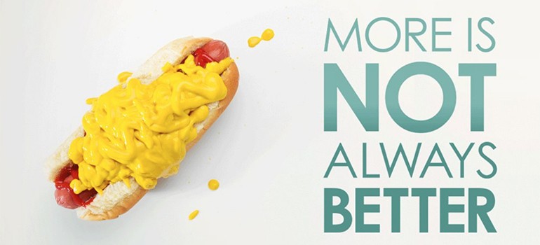 A hot dog with too much mustard
